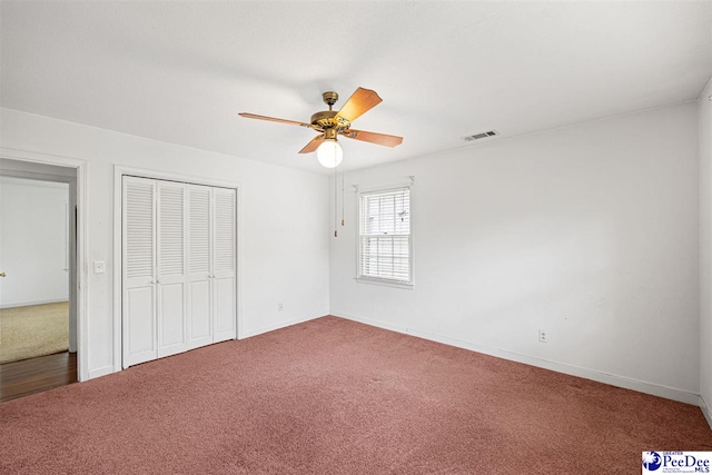 1110 Dunvegan Rd, Florence, SC 29501 - unfurnished bedroom with carpet floors, a closet, and a ceiling fan
