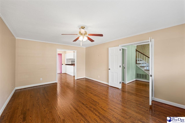 1110 Dunvegan Rd, Florence, SC 29501 - empty room featuring ceiling fan, wood finished floors, ornamental molding, and stairway