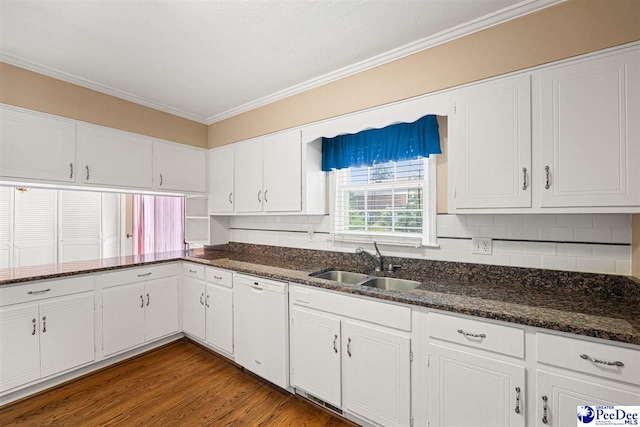 1110 Dunvegan Rd, Florence, SC 29501 - kitchen featuring dishwasher, ornamental molding, white cabinetry, tasteful backsplash, and dark stone countertops