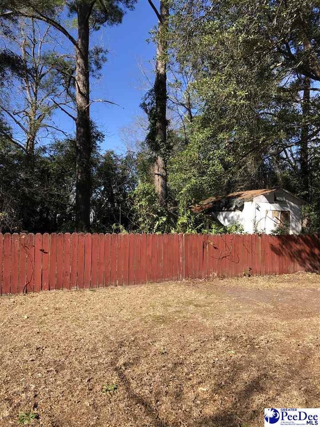 view of yard featuring fence