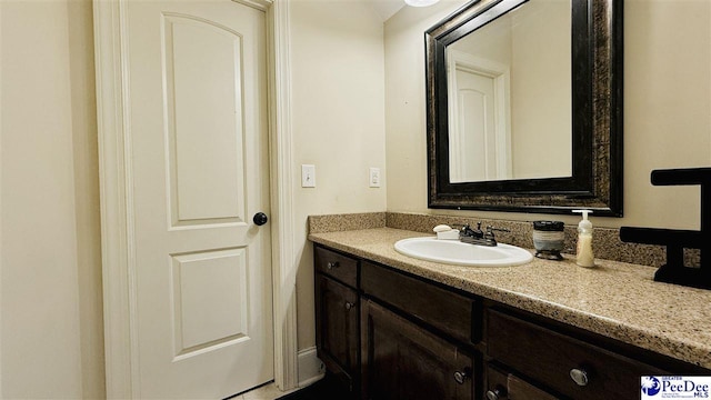 bathroom featuring vanity