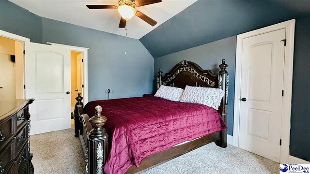 bedroom with lofted ceiling, light carpet, and ceiling fan