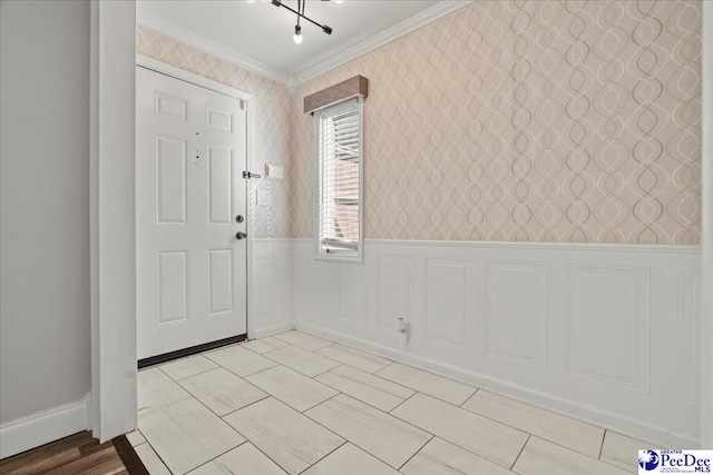 entrance foyer featuring ornamental molding