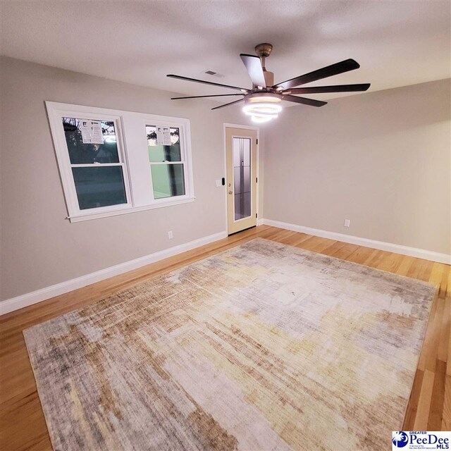 139 Wingate Ave, Florence, SC 29506 - empty room with ceiling fan, wood finished floors, and baseboards