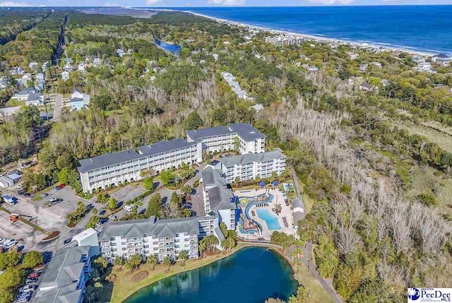 bird's eye view with a water view