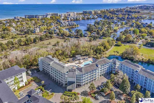 bird's eye view with a water view