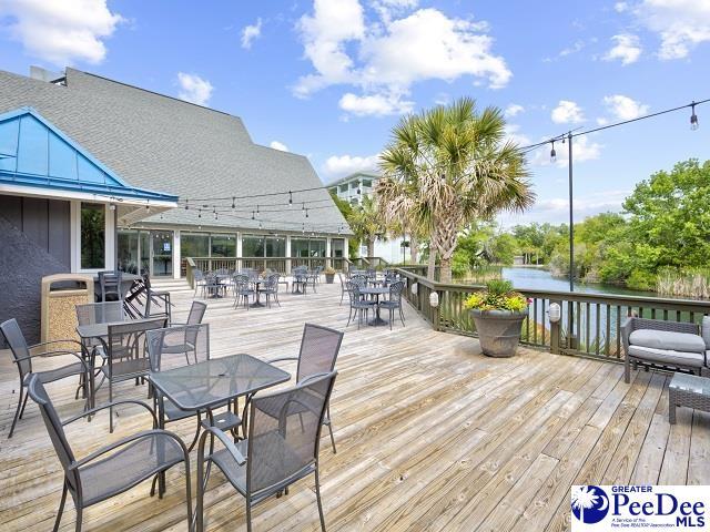 deck featuring outdoor dining space