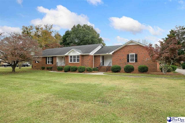 ranch-style house with a front lawn