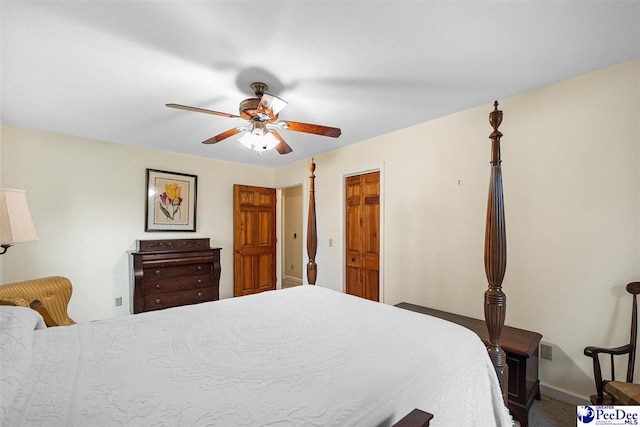 bedroom with ceiling fan and a closet