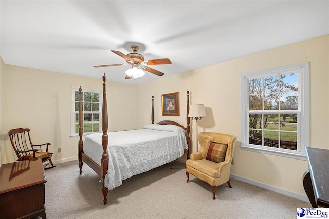 bedroom featuring ceiling fan and carpet flooring