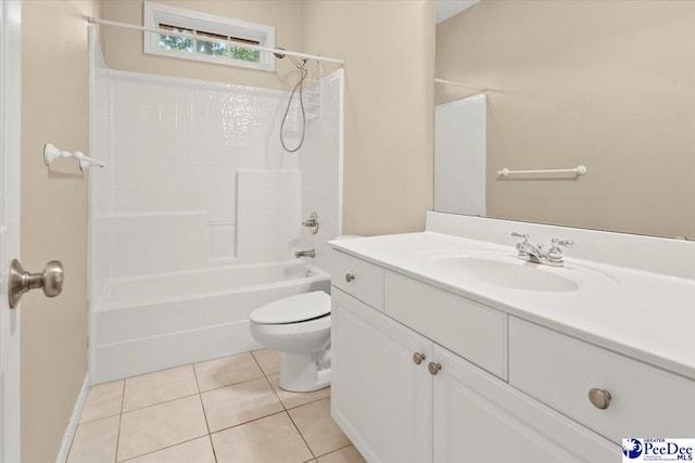 bathroom featuring toilet, washtub / shower combination, tile patterned flooring, and vanity