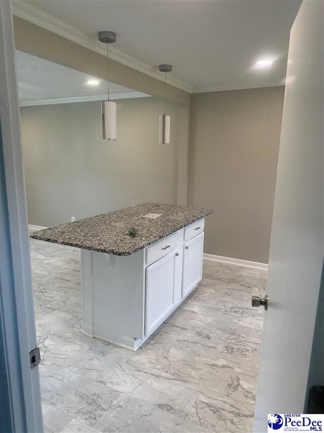 interior space with crown molding