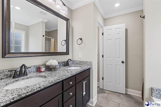 3209 Haven Straits, Florence, SC 29505 - bathroom with double vanity, crown molding, baseboards, tile patterned floors, and recessed lighting