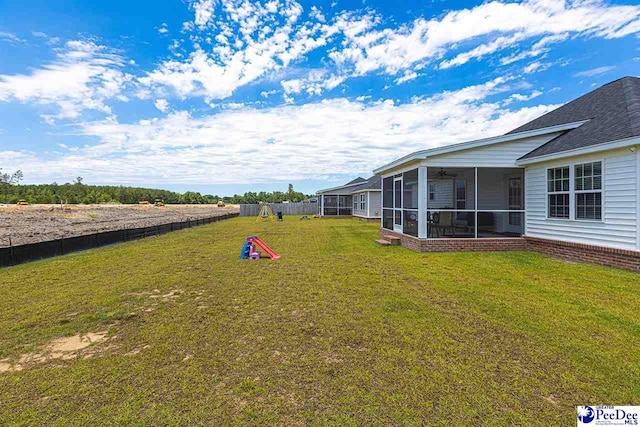 3209 Haven Straits, Florence, SC 29505 - view of yard with a sunroom and ceiling fan