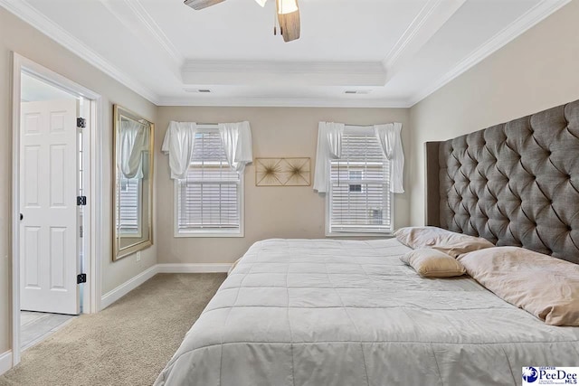 3209 Haven Straits, Florence, SC 29505 - carpeted bedroom featuring a tray ceiling, ornamental molding, baseboards, and a ceiling fan