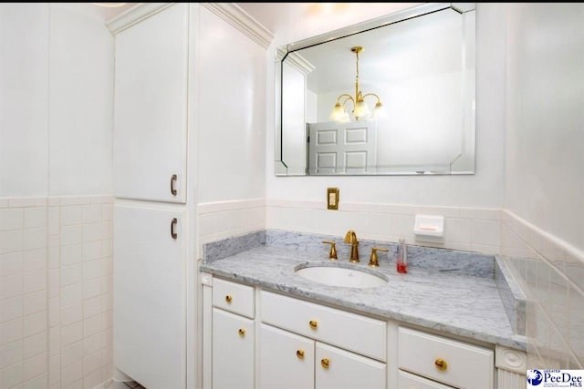 101 E Claff Cir, Lake City, SC 29501 - bathroom featuring vanity and a notable chandelier