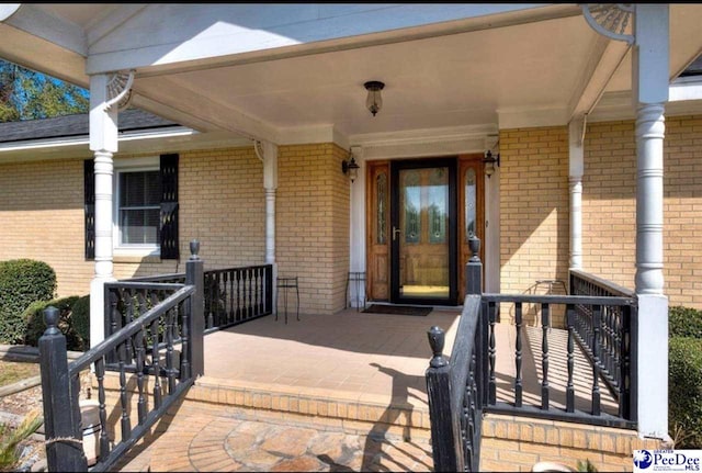 101 E Claff Cir, Lake City, SC 29501 - view of exterior entry with a porch