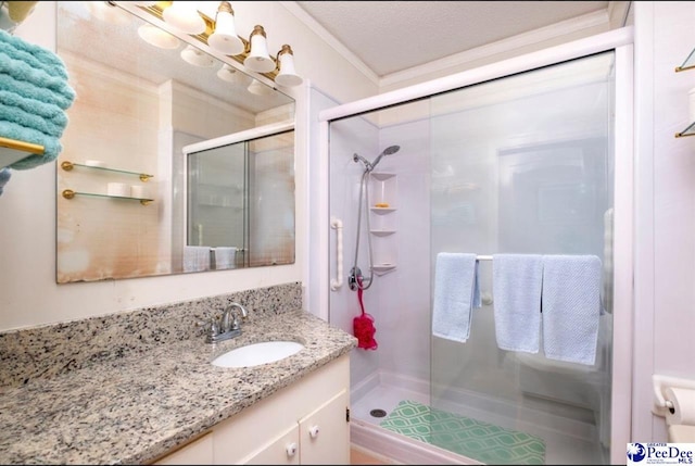 101 E Claff Cir, Lake City, SC 29501 - bathroom with an enclosed shower, vanity, ornamental molding, and a textured ceiling
