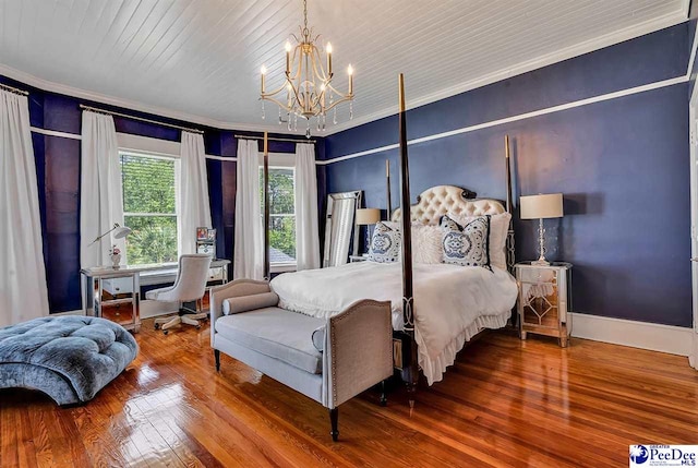 bedroom featuring crown molding, an inviting chandelier, hardwood / wood-style floors, and wooden ceiling