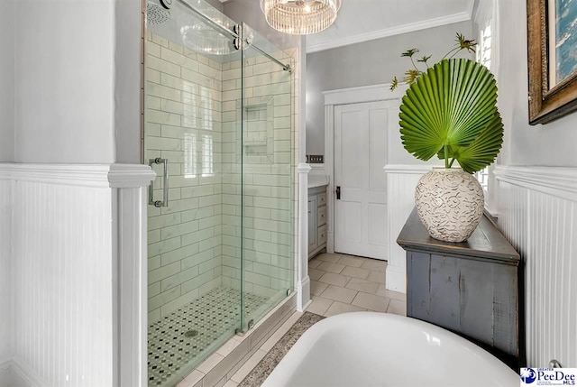 bathroom with independent shower and bath, crown molding, and tile patterned flooring