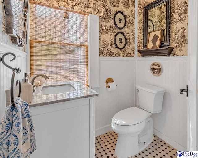 bathroom with vanity and toilet