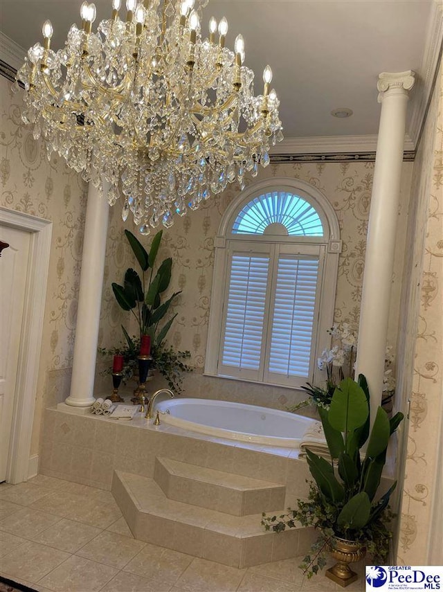 bathroom with decorative columns, ornamental molding, tile patterned flooring, and tiled bath