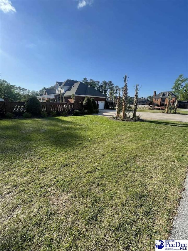 view of yard featuring a garage