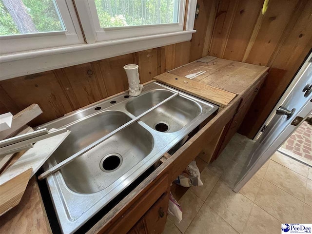 1009 Trailwood Dr, Hartsville, SC 29550 - kitchen view of a sink and wooden walls