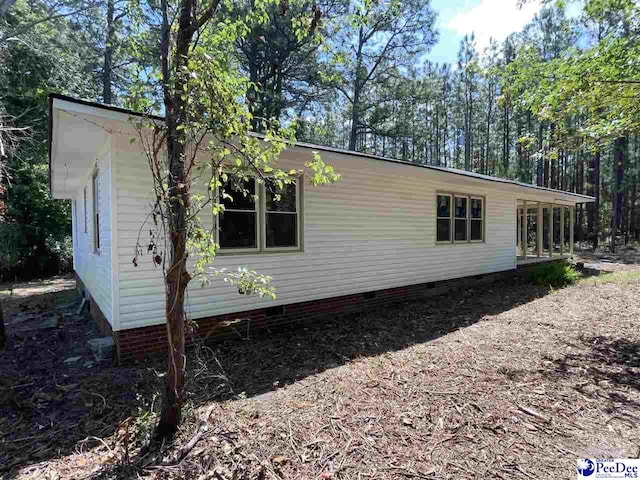 1009 Trailwood Dr, Hartsville, SC 29550 - view of side of property featuring crawl space