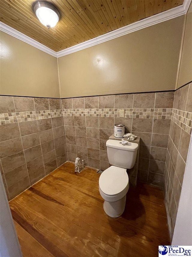 1009 Trailwood Dr, Hartsville, SC 29550 - bathroom with ornamental molding, toilet, tile walls, wood finished floors, and wooden ceiling