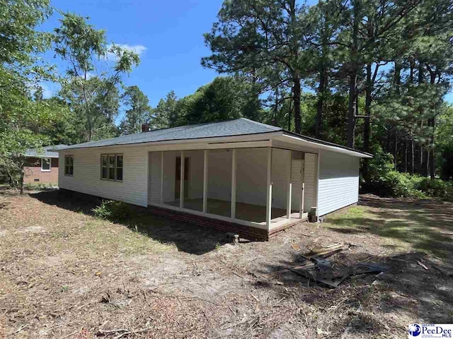 1009 Trailwood Dr, Hartsville, SC 29550 - rear view of property featuring a sunroom