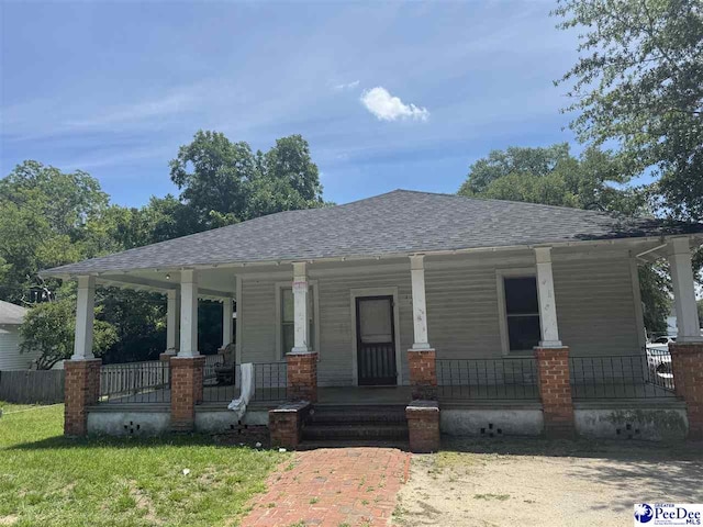119 Sanders St, Darlington, SC 29532 - view of front of house with covered porch and a shingled roof