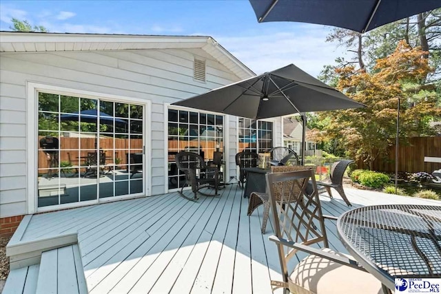100 Mckellar St, Bennettsville, SC 29512 - wooden terrace with outdoor dining area