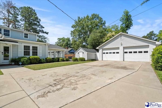 100 Mckellar St, Bennettsville, SC 29512 - view of side of property with a garage and an outdoor structure