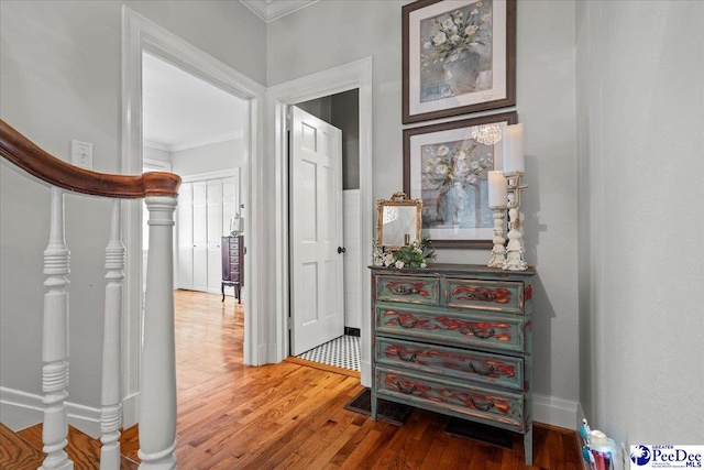 100 Mckellar St, Bennettsville, SC 29512 - hallway featuring crown molding, wood finished floors, and baseboards