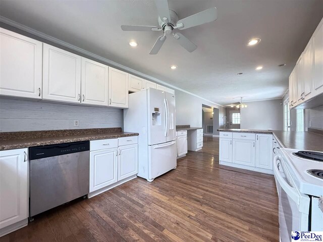 148 High Hill Rd, Lake View, SC 29563 - kitchen with white appliances, crown molding, a peninsula, white cabinets, and dark wood-type flooring