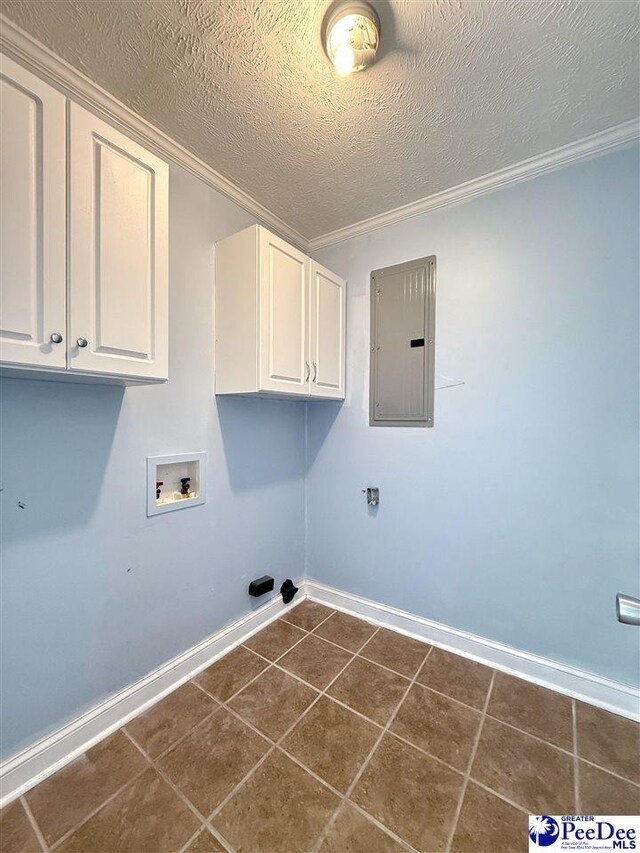 148 High Hill Rd, Lake View, SC 29563 - laundry area featuring electric panel, cabinet space, washer hookup, dark tile patterned floors, and a textured ceiling