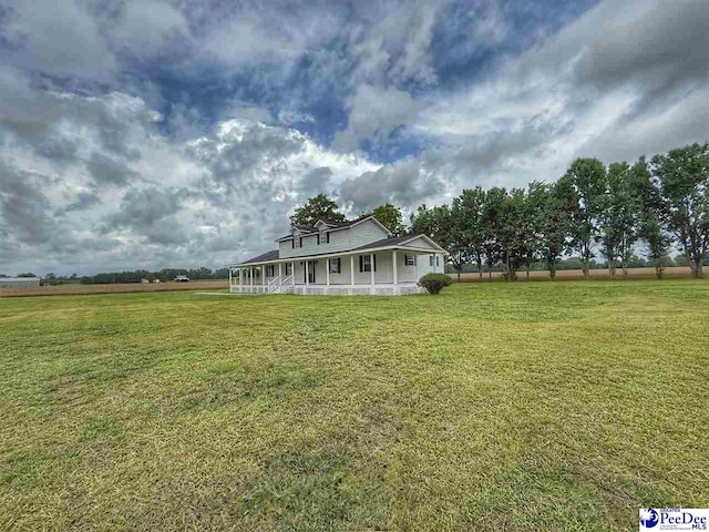 148 High Hill Rd, Lake View, SC 29563 - farmhouse-style home featuring a porch and a front lawn