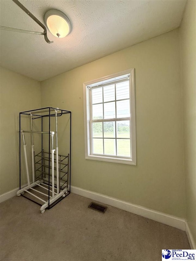 148 High Hill Rd, Lake View, SC 29563 - unfurnished bedroom featuring carpet and a textured ceiling