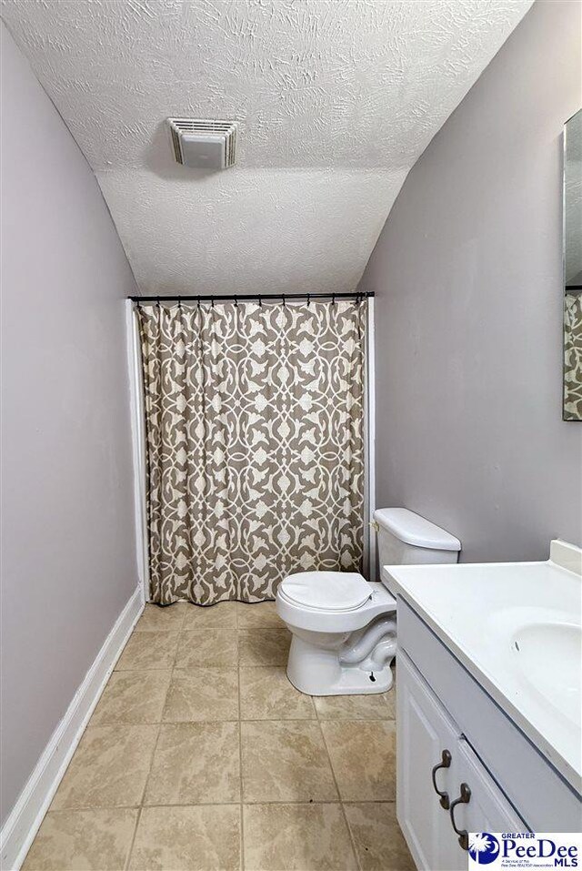 148 High Hill Rd, Lake View, SC 29563 - full bathroom featuring vanity, a textured ceiling, tile patterned flooring, and a shower with shower curtain