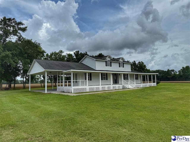 148 High Hill Rd, Lake View, SC 29563 - view of front of home with covered porch, a front yard, an attached carport, and roof with shingles