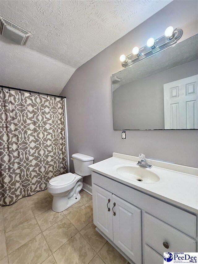 148 High Hill Rd, Lake View, SC 29563 - full bath with vanity, tile patterned flooring, a textured ceiling, and lofted ceiling