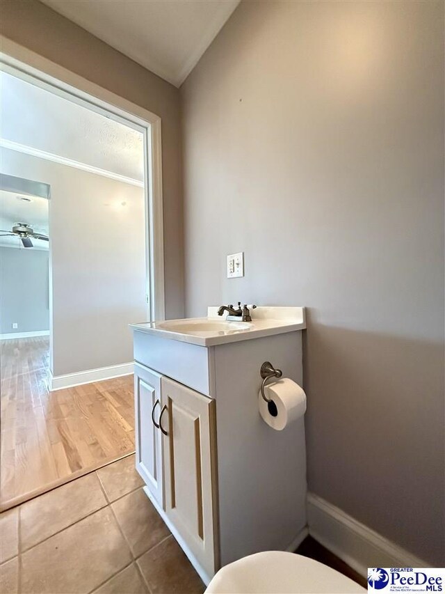 148 High Hill Rd, Lake View, SC 29563 - bathroom with vanity, ceiling fan, and tile patterned flooring