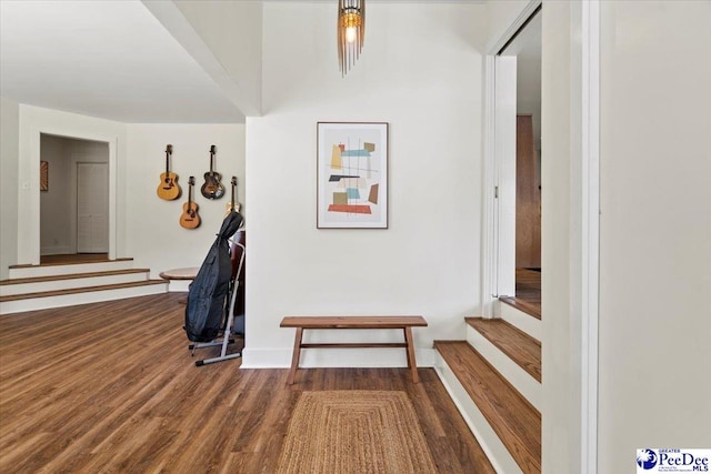 hall with wood-type flooring