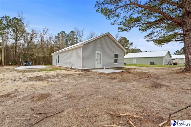 back of house featuring a patio