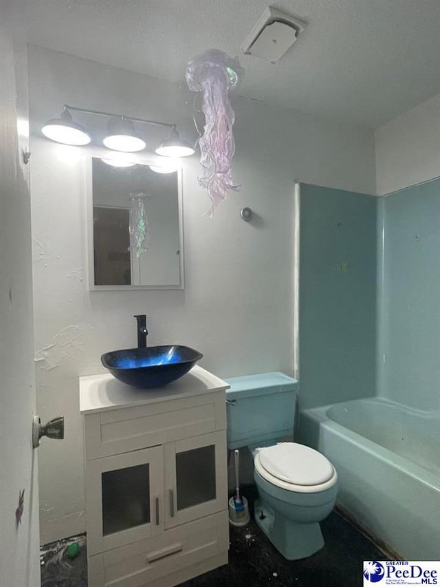 full bathroom featuring vanity, shower / bathtub combination, and toilet