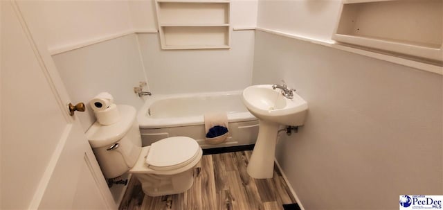 107 Patterson St, Bennettsville, SC 29512 - bathroom with wood finished floors and toilet