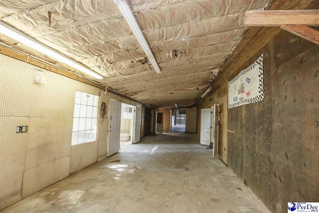 miscellaneous room with concrete flooring