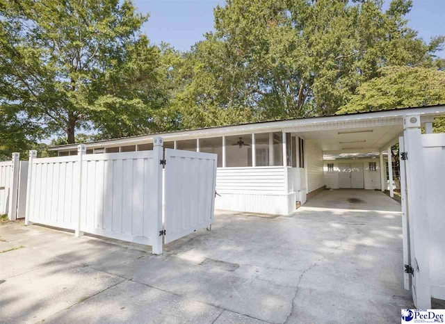 garage featuring a carport