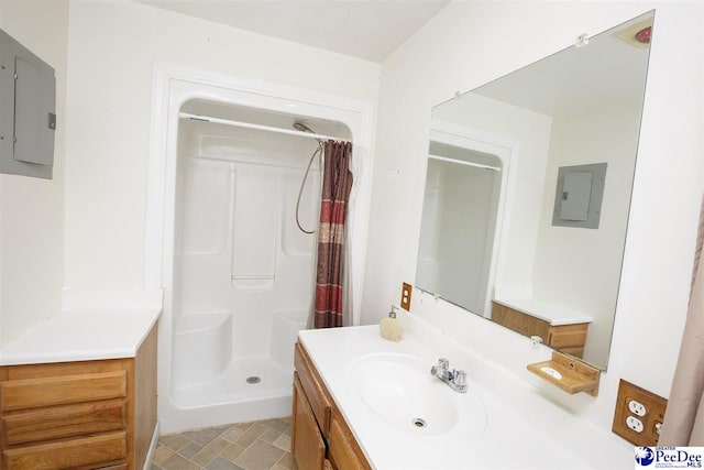 bathroom featuring vanity, electric panel, and a shower with shower curtain